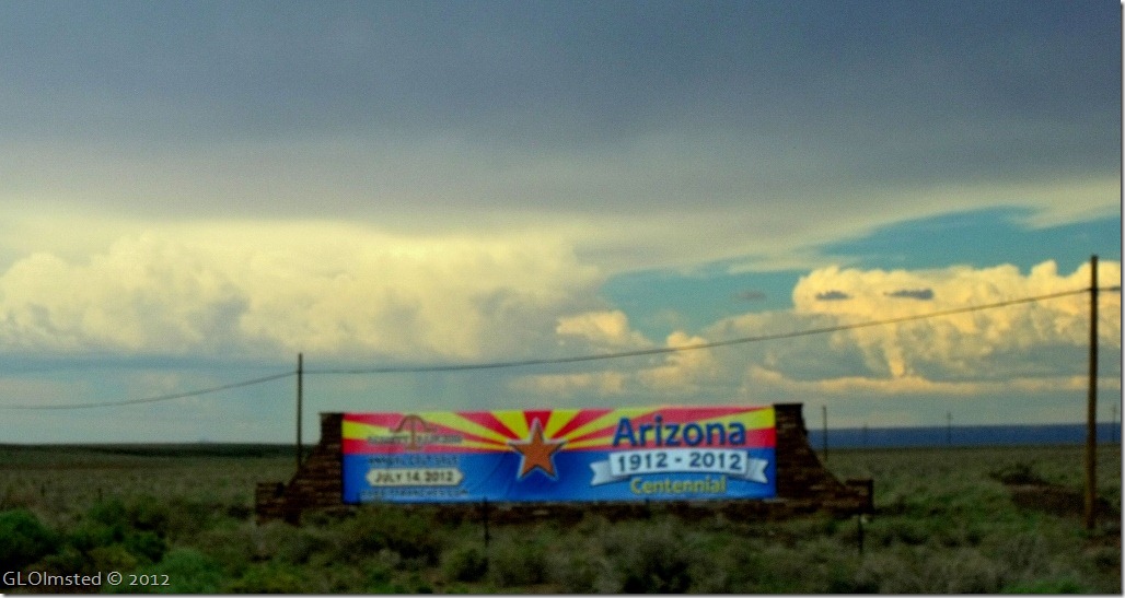 03 Stormy sky over AZ centennial sign along SR89 N (1024x543)