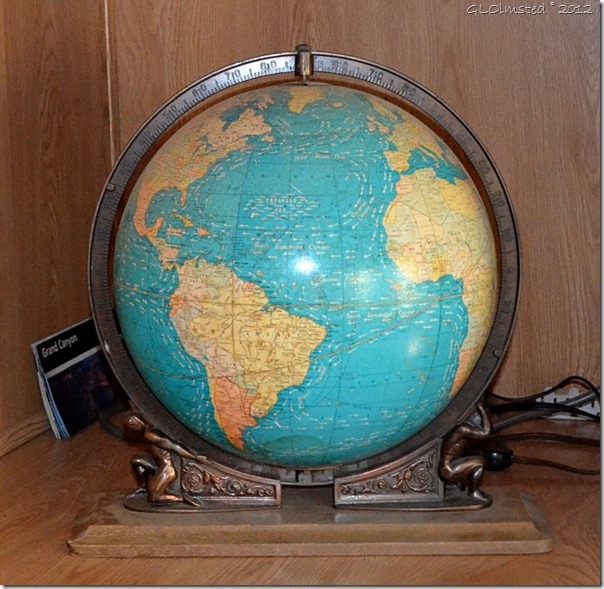 01 Cram Lighted Globe Supported by Twin Atlases (872x850)