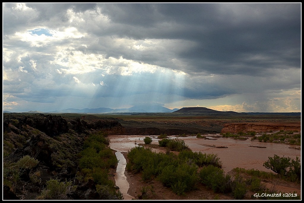 Little Colorado River at Grand Falls and sun rays over Mt Humphreys Navajo Reservation Arizona