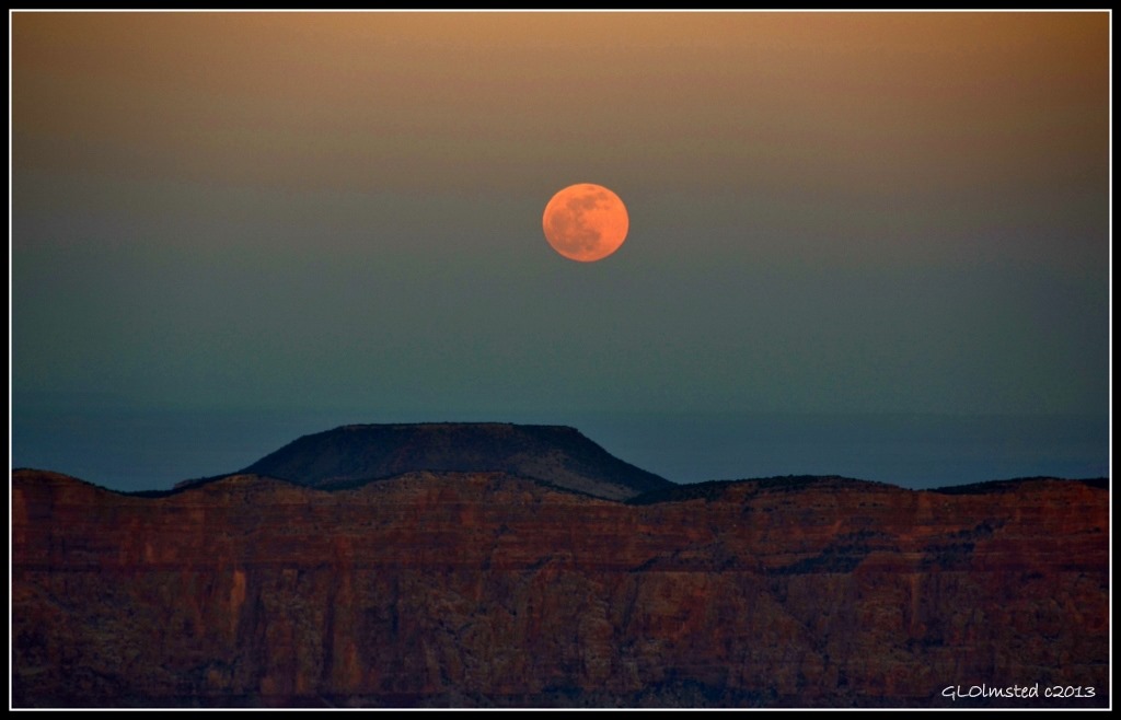 Full moon rising over Cedar Mountain from Cape Royal North Rim Grand Canyon National Park Arizona