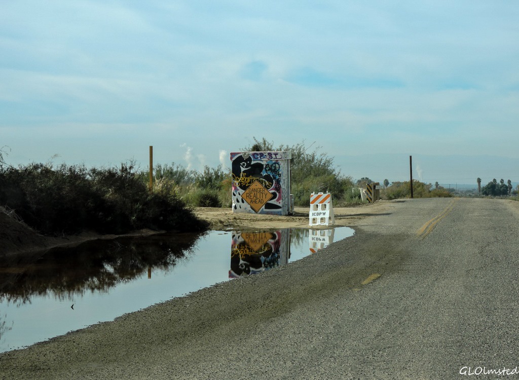 Danger Reality Ahead sign leaving The Slabs Niland California