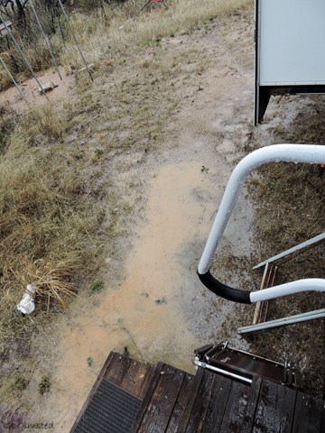 Large puddle outside 5th-wheel door Yarnell Arizona