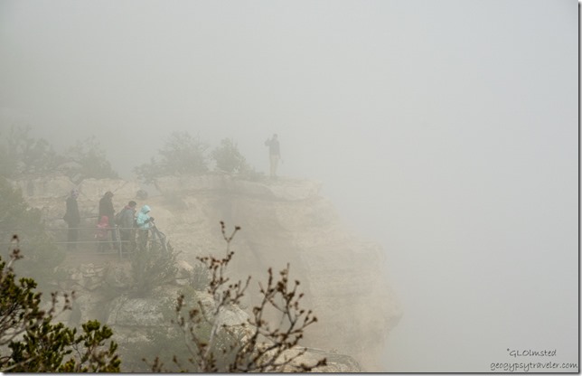 Visitors in the fog North Rim Grand Canyon National Park Arizona