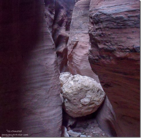 Boulder in slot canyon Wire Pass trail Grand Staircase-Escalante National Monument Utah