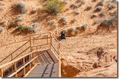 Bill and Sasha at bottom of stairs Atlatl Rock Valley of Fire State Park Nevada