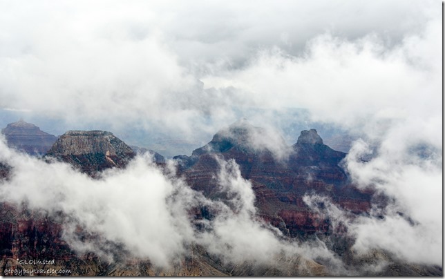 Clouds drift thru canyon from Lodge North Rim Grand Canyon National Park Arizona