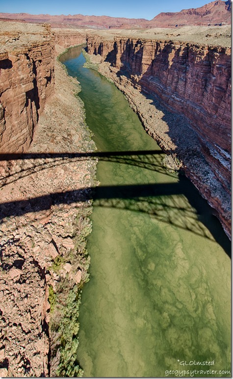 Sediment swirls Colorado River Navajo bridge Marble Canyon Arizona