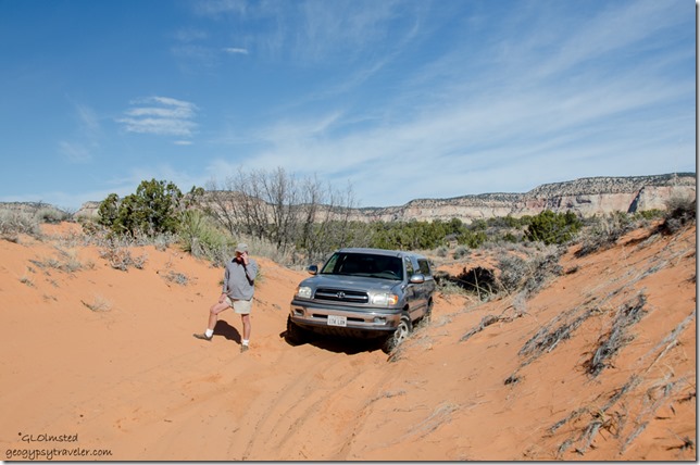 Bill & dead truck sand dunes ATV road to Peekaboo Canyon Utah