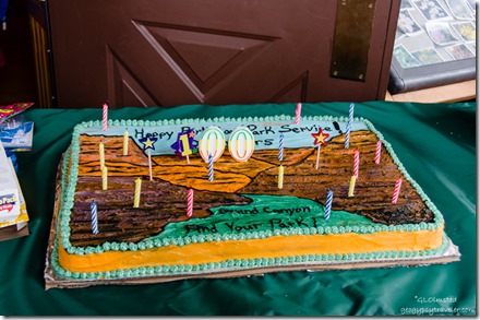 NPS100 birthday cake with candles Visitor Center porch North Rim Grand Canyon National Park Arizona