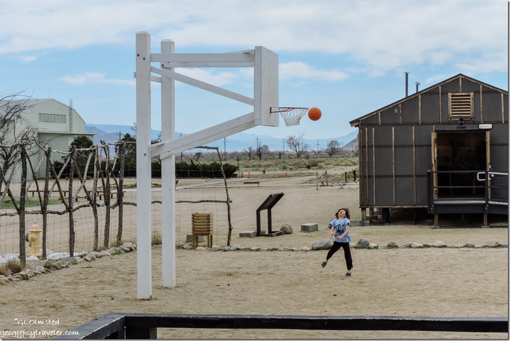 Asian boy playing basketball Manzanar National Historic Site Independence California