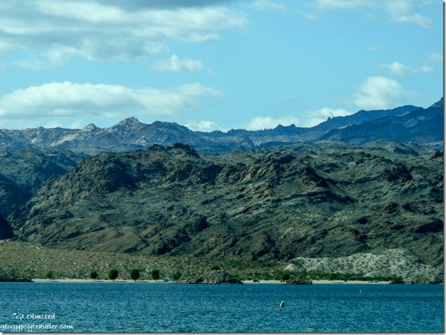 View West of mountains & river along Colorado River frontage road North of Bullhead City Arizona