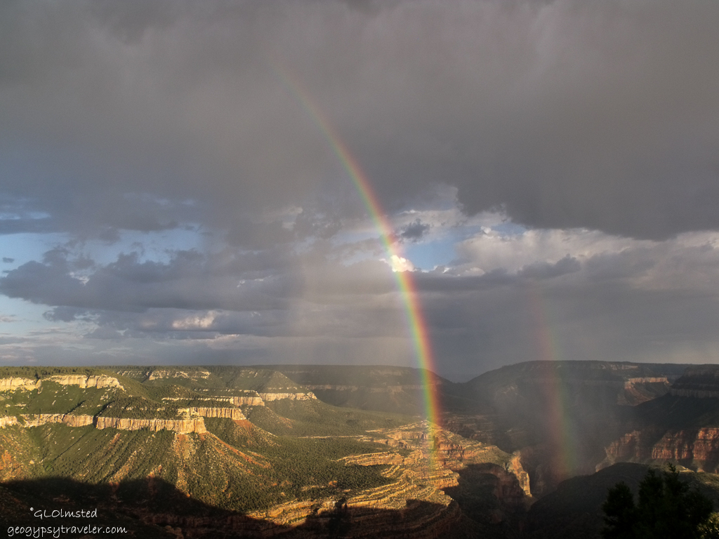 View South of rainbows over canyon from Crazy Jug Point FS292 Kaibab National Forest Arizona