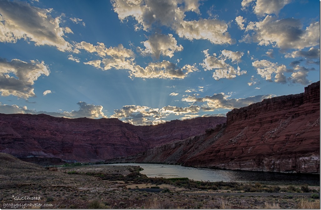 sunrise rays Echo Cliffs Colorado River from camp Lee's Ferry Glen Canyon National Recreation Area Arizona