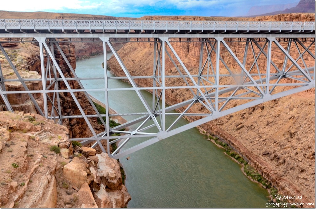 Muddy Paria River mixing with Colorado River from Navajo Bridge Marble Canyon Arizona