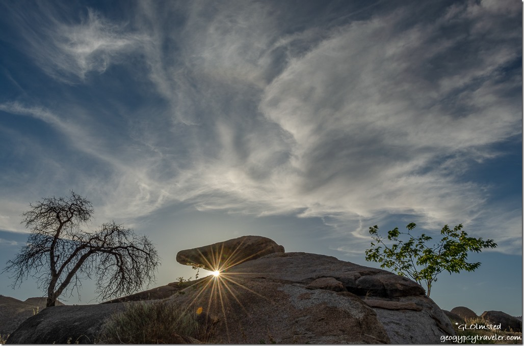 boulders trees last light clouds sunburst Yarnell Arizona