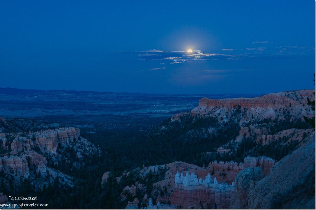 Amphitheater hoodoos full moon clouds Sunset Point Bryce Canyon National Park Utah