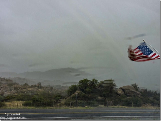 wind blown flag bushes rain Yarnell Arizona