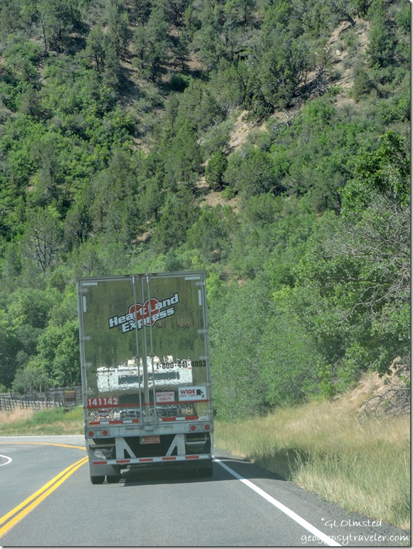 truckcamper reflection in semi SR89 South Utah