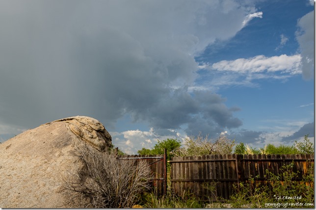 boulder fence stormy sky Yarnell Arizona