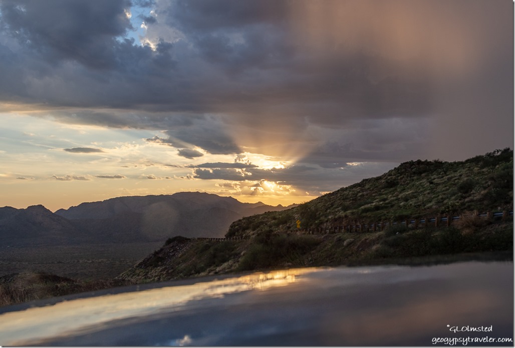 car reflection Weaver & Date Creek Mountains sunset cumulus mediocris clouds virga crespuscular rays SR89 Arizona