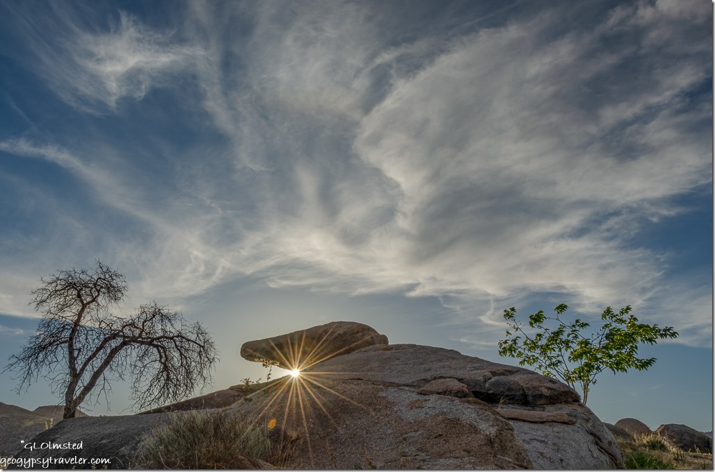boulders trees last light clouds sunburst Yarnell Arizona