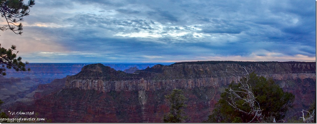 Low clouds at sunset over canyon from Lodge North Rim Grand Canyon National Park Arizona