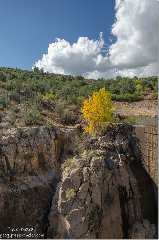 boulders dam fall Poplar tree hillside clouds Fain Lake Park Prescott Valley Arizona