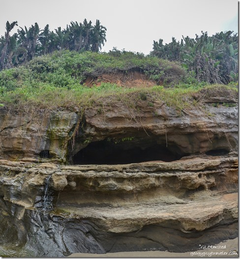 Water runs out of beach cave Wild Coast Sun Port Edward South Africa