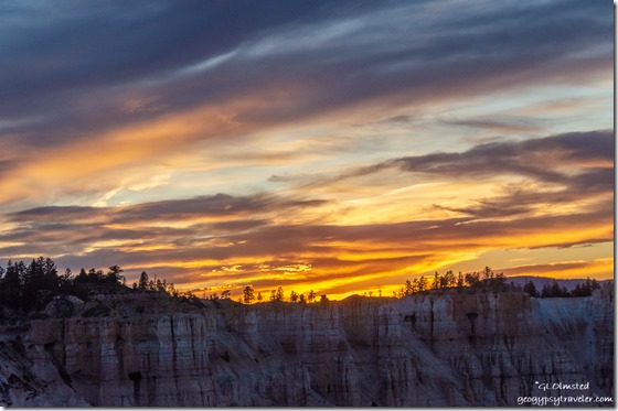 hoodoos amphitheater trees sunset clouds from Bryce Point Bryce Canyon National Park Utah