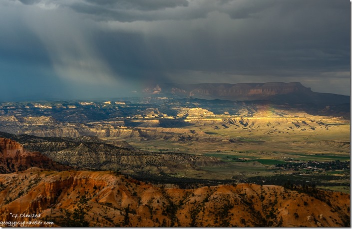 red hills Tropic valley Blue Cliffs Aquarius Plateau sunrays rainbow storm clouds from Bryce Pt Bryce Canyon National Park Utah