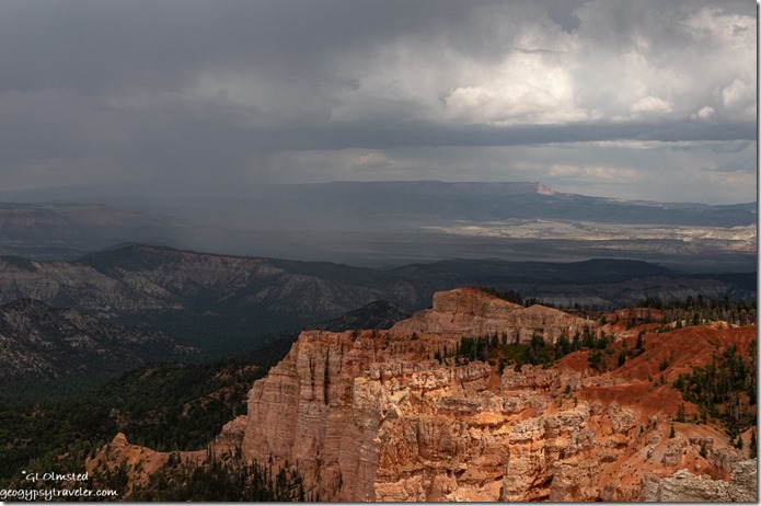 Pink Cliffs valley trees storm clouds Rainbow Point Bryce Canyon National Park Utah