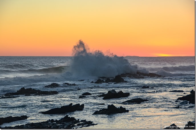 Sunset over crashing waves at Storms River Mouth Tsitsikamma National Park South Africa