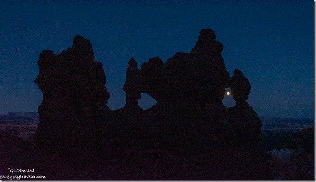 full Harvest moon thru mask hoodoo window Navajo Loop Trail Bryce Canyon National Park Utah