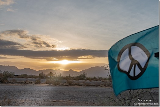 peace flag desert mountains sunset clouds Roadrunner BLM Quartzsite Arizona