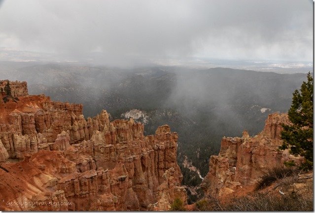 hoodoos snow valley low clouds Bryce Canyon National Park Utah
