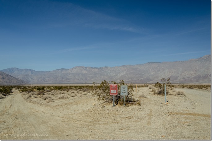Jct 2 sand roads with signs & Santa Rosa Mts Anza-Borrego Desert State Park California