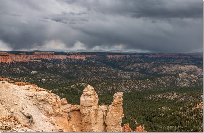 hoodoos Pink Cliffs valley snowy mts storm clouds Rainbow Pt Bryce Canyon National Park Utah