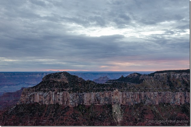 Low clouds at sunset over Oza Butte from Lodge North Rim Grand Canyon National Park Arizona