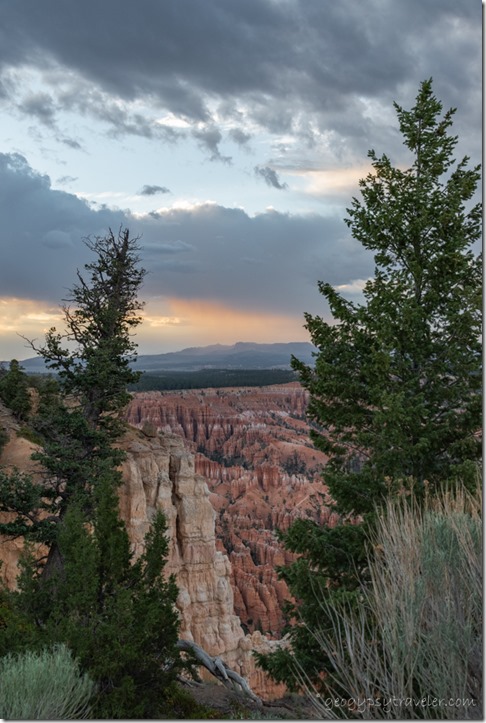 trees hoodoos sunset clouds Bryce Canyon National Park Utah