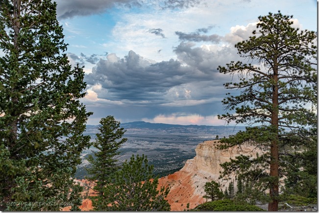 trees Pink Cliffs valley stormy sunset clouds Bryce Canyon National Park Utah