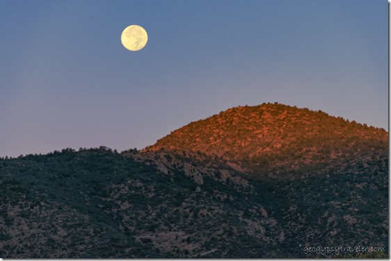 first light Brushy Mountain full moon set Skull Valley Arizona