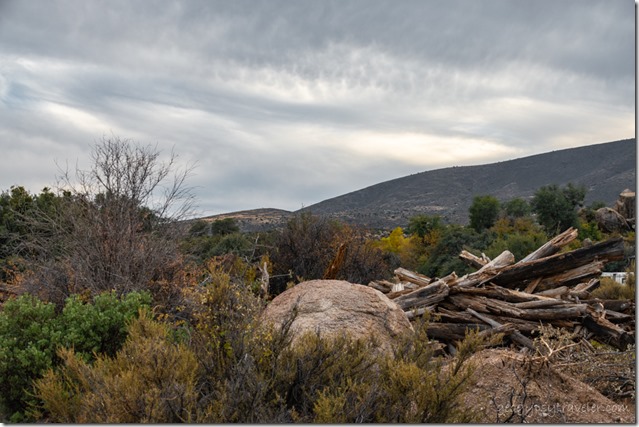 bushes boulders clouds Skull Valley Arizona