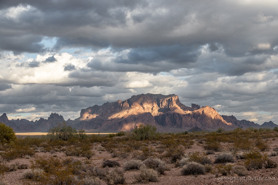 https://geogypsytraveler.com/wp-content/uploads/2022/03/10a-DSL_8663lewfbr-desert-Kofa-Mts-light-shadows-clouds-BLM-Palm-Canyon-Rd-Kofa-NWR-AZ-g.jpg