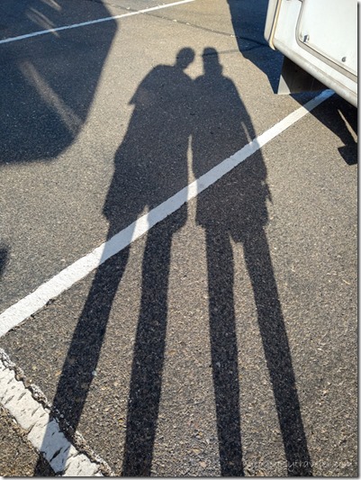 Gaelyn & Gayle shadow selfie Quechan Rez parking lot at AZ-Mexico border