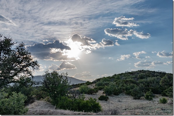 grass trees clouds sunrays Skull Valley AZ