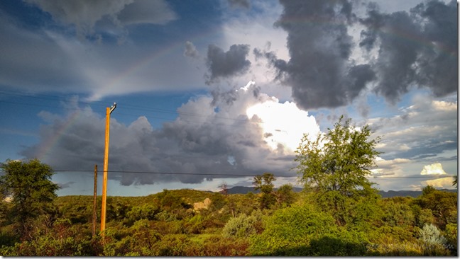 view E storm clouds rainbow Skull Valley AZ
