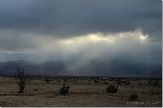 Last light thru storm clouds Vallecito Mts Anza-Borrego Desert SP CA