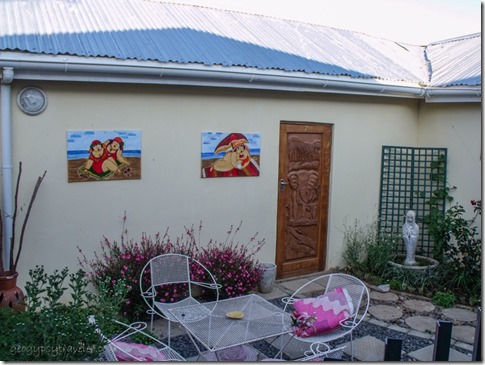 Guest room door_paintings & courtyard at TeTeMuka B&B Lodge Kokstad KwaZulu-Natal South Africa