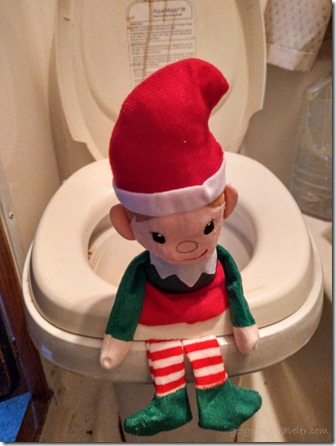 elf on toilet