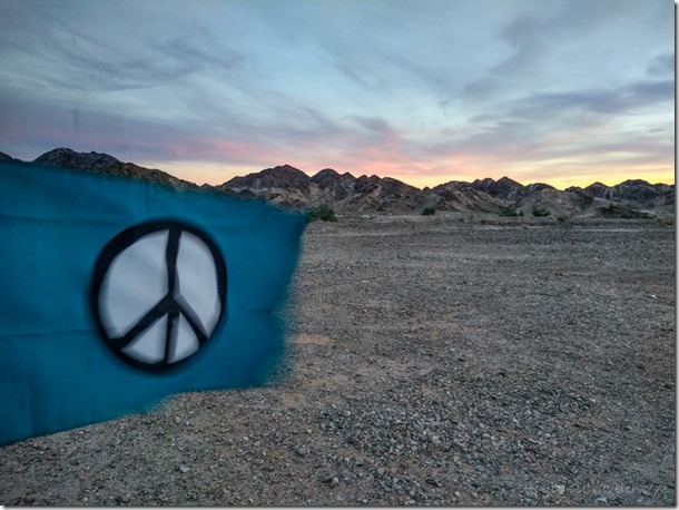 flag reverse sunset clouds Cargo Muchacho Mts BLM Tumco CA